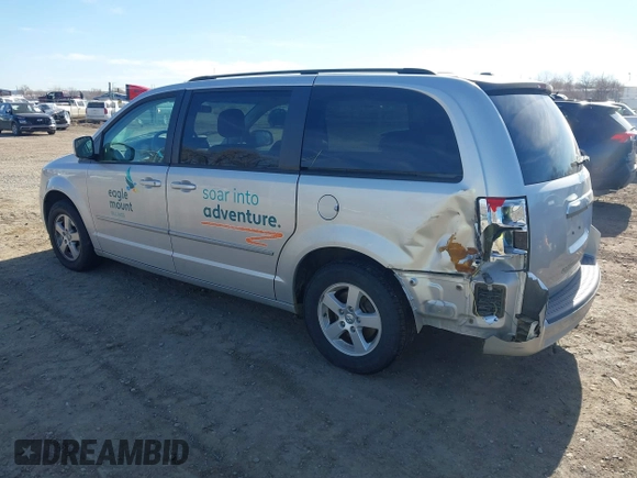 2010 Dodge Grand Caravan SXT with VIN 2D4RN5D19AR406197, listed as a IAAI auction lot 41854505 with 140,760 mi miles and . Bid and sale history available at DreamBid. Image 3.