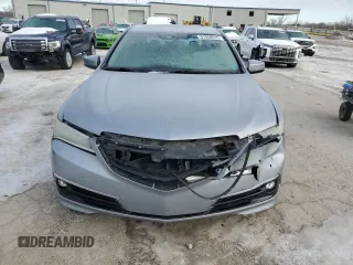 2015 Acura TLX Advance z VIN 19UUB3F77FA005007, wystawiony jako Copart lot #87959515 z przebiegiem 112 210 mil mil oraz Szkoda całkowita • Salvage title. Historia ofert i sprzedaży dostępna na DreamBid. Obrazek 5.