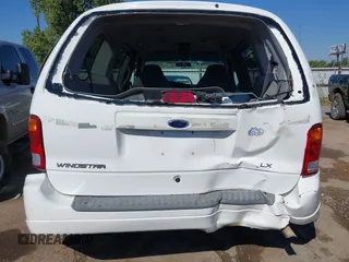 2002 Ford Windstar GL with VIN 2FMDA51442BB28784, listed as a IAAI auction lot 40236485 with 73,137 mi miles and . Bid and sale history available at carsss.com. Image 16.