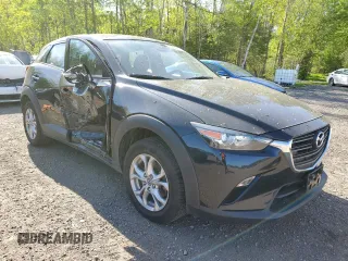2019 Mazda CX-3 Touring z VIN JM1DKFC70K0412204, wystawiony jako Copart lot #56648515 z przebiegiem 93 252 mil mil oraz Czysty tytuł • Clean title. Historia ofert i sprzedaży dostępna na DreamBid. Obrazek 4.