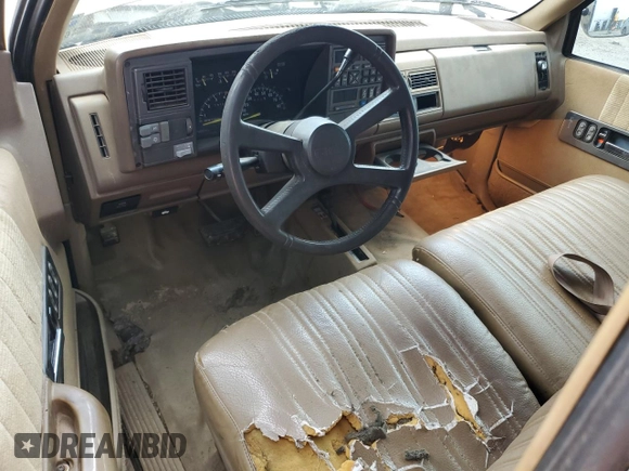 1994 GMC Sierra 1500 z VIN 2GTEK19K3R1574913, wystawiony jako Copart lot #55939635 z przebiegiem 191 240 mil mil oraz Szkoda całkowita • Salvage title. Historia ofert i sprzedaży dostępna na DreamBid. Obrazek 8.