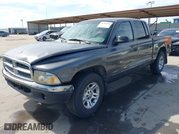 2001 Dodge Dakota z VIN 1B7HL2AX51S333575, wystawiony jako IAAI lot #41782582 z przebiegiem 291 640 mil mil oraz . Historia ofert i sprzedaży dostępna na DreamBid. Obrazek 20.