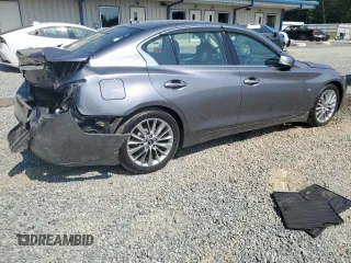 2018 Infiniti Q50 Luxe with VIN JN1EV7AR8JM443555, listed as a Copart auction lot 59691455 with 65,615 mi miles and Salvage title. Bid and sale history available at DreamBid. Image 3.