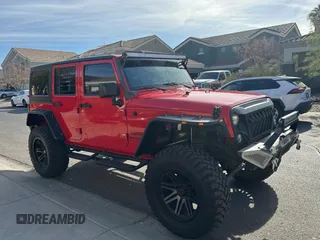2018 Jeep Wrangler JK Unlimited Sport S with VIN 1C4BJWDG7JL828871, listed as a Copart auction lot 87530425 with 60,958 mi miles and Clean Title. Bid and sale history available at carsss.com. Image 1.