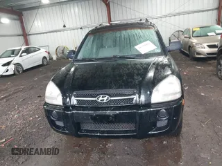 2005 Hyundai Tucson GL with VIN KM8JM12B75U072080, listed as a IAAI auction lot 41779464 with 191,771 mi miles. Bid and sale history available at carsss.com. Image 12.