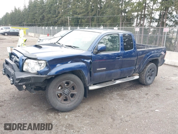 2006 Toyota Tacoma with VIN 5TEUU42N06Z165755, listed as a IAAI auction lot 41619786 with 168,910 mi miles. Bid and sale history available at carsss.com. Image 2.