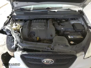 2007 Kia Rondo EX with VIN KNAFG526677101045, listed as a Copart auction lot 82483754 with 152,572 mi miles and Salvage Title. Bid and sale history available at carsss.com. Image 12.
