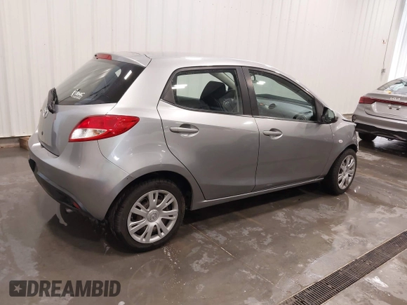 2014 Mazda 2 Sport with VIN JM1DE1KY3E0174566, listed as a IAAI auction lot 41973075 with 126,772 mi miles. Bid and sale history available at carsss.com. Image 4.