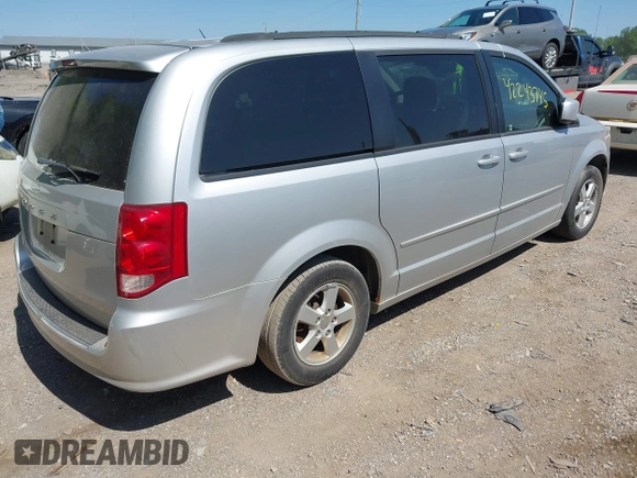 2012 Dodge Grand Caravan SXT with VIN 2C4RDGCG8CR139963, listed as a IAAI auction lot 42243745 with 185,730 mi miles and . Bid and sale history available at DreamBid. Image 4.