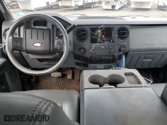 2011 Ford F-250 XL with VIN 1FT7X2A6XBEA83144, listed as a Copart auction lot 79005584 with 207,398 mi miles and Salvage title. Bid and sale history available at DreamBid. Image 8.