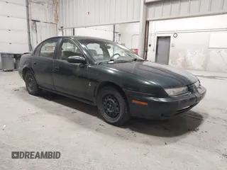 1999 Saturn SL с VIN 1G8ZK5279XZ303366, выставлен на аукционе IAAI как лот 42510468 с пробегом 125 860 миль миль и . История ставок и продаж доступна на DreamBid. Изображение 1.