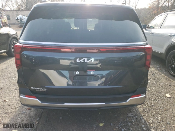 2025 Kia Carnival SX with VIN KNDNE5K33S6486847, listed as a Copart auction lot 82099044 with 10 mi miles and Salvage Title. Bid and sale history available at carsss.com. Image 6.