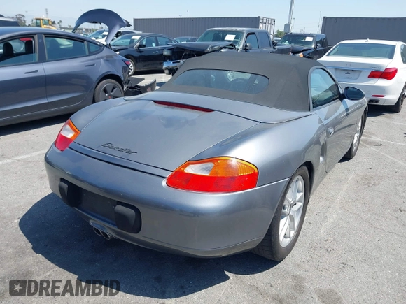 2002 Porsche Boxster with VIN WP0CA29822U623355, listed as a IAAI auction lot 41916973 with 120,102 mi miles and . Bid and sale history available at DreamBid. Image 4.