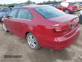 2017 Volkswagen Jetta S z VIN 3VW2B7AJ2HM314001, wystawiony jako IAAI lot #42602453 z przebiegiem 88 464 mil mil oraz . Historia ofert i sprzedaży dostępna na DreamBid. Obrazek 3.