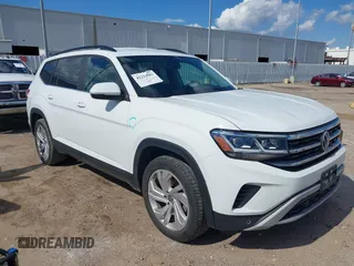 2021 Volkswagen Atlas SE z VIN 1V2WR2CA9MC585700, wystawiony jako IAAI lot #42234502 z przebiegiem 46 040 mil mil oraz . Historia ofert i sprzedaży dostępna na DreamBid. Obrazek 1.