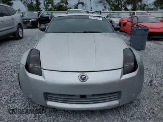 2004 Nissan 350Z Touring z VIN JN1AZ34E84T063971, wystawiony jako Copart lot #57267825 z przebiegiem 131 036 mil mil oraz Szkoda całkowita • Salvage title. Historia ofert i sprzedaży dostępna na DreamBid. Obrazek 5.