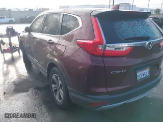 2019 Honda CR-V LX with VIN 2HKRW5H31KH415531, listed as a IAAI auction lot 41769399 with 79,584 mi miles. Bid and sale history available at carsss.com. Image 3.