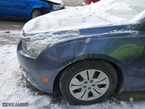 2014 Chevrolet Cruze LS with VIN 1G1PB5SG7E7142059, listed as a IAAI auction lot 41435050 with 106,067 mi miles. Bid and sale history available at carsss.com. Image 16.