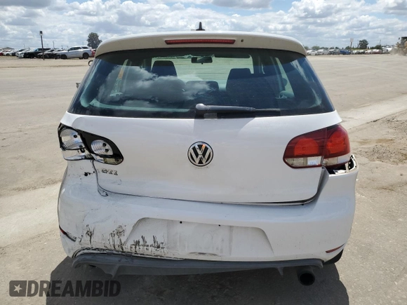 2011 Volkswagen GTI PZEV z VIN WVWHD7AJ2BW174241, wystawiony jako Copart lot #56940305 z przebiegiem 112 705 mil mil oraz Szkoda całkowita • Salvage title. Historia ofert i sprzedaży dostępna na DreamBid. Obrazek 6.
