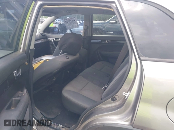 2013 Kia Sorento LX with VIN 5XYKT3A1XDG381218, listed as a IAAI auction lot 42511747 with 130,253 mi miles and . Bid and sale history available at DreamBid. Image 8.