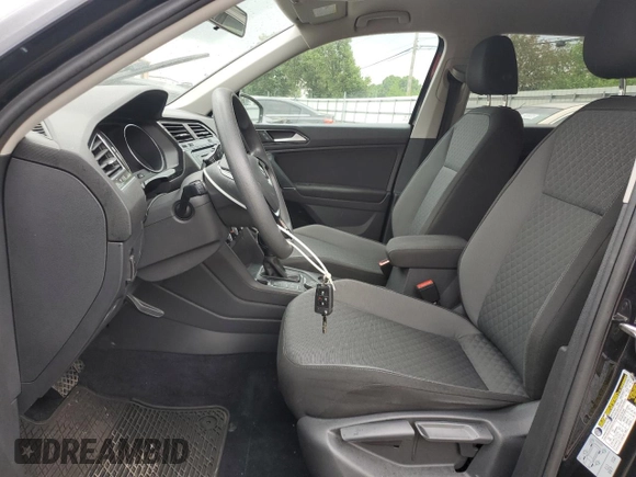 2018 Volkswagen Tiguan S with VIN 3VV0B7AX3JM055587, listed as a Copart auction lot 59751225 with 66,779 mi miles and Salvage title. Bid and sale history available at DreamBid. Image 7.