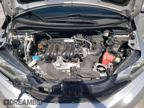 2016 Honda Fit LX z VIN JHMGK5H57GX020610, wystawiony jako Copart lot #61012305 z przebiegiem 99 001 mil mil oraz Szkoda całkowita • Salvage title. Historia ofert i sprzedaży dostępna na DreamBid. Obrazek 12.