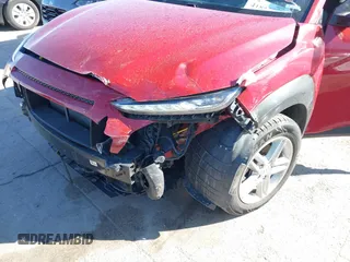 2021 Hyundai Kona SE with VIN KM8K12AA7MU645814, listed as a IAAI auction lot 41852932 with 85,044 mi miles and . Bid and sale history available at DreamBid. Image 6.
