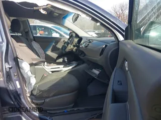 2014 Kia Sportage LX with VIN KNDPB3ACXE7548170, listed as a IAAI auction lot 41651204 with 71,280 mi miles and . Bid and sale history available at carsss.com. Image 5.