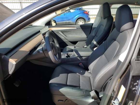 2025 Tesla Model Y Long Range with VIN 7SAYGDEE7SA345301, listed as a Copart auction lot 46693835 with 1,733 mi miles and Salvage Title. Bid and sale history available at carsss.com. Image 7.