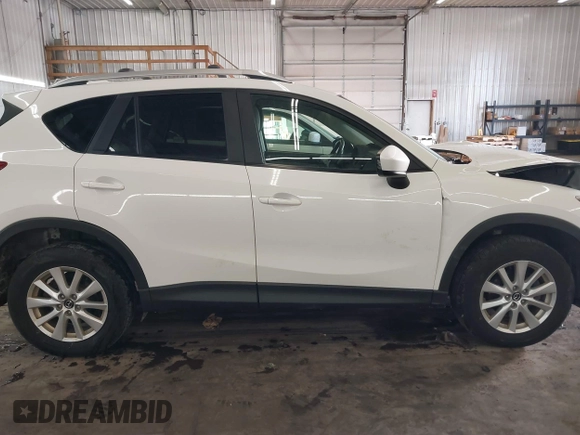 2014 Mazda CX-5 Touring with VIN JM3KE4CY4E0321055, listed as a IAAI auction lot 41613593 with 174,339 mi miles. Bid and sale history available at carsss.com. Image 14.