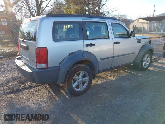 2007 Dodge Nitro SXT with VIN 1D8GU28K67W740794, listed as a IAAI auction lot 41591855 with 162,709 mi miles. Bid and sale history available at carsss.com. Image 4.