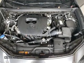 2023 Mazda CX-30 S Carbon Edition z VIN 3MVDMBCM5PM569903, wystawiony jako Copart lot #84850594 z przebiegiem 14 653 mil mil oraz Szkoda całkowita • Salvage title. Historia ofert i sprzedaży dostępna na DreamBid. Obrazek 12.