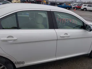 2015 Ford Taurus Limited with VIN 1FAHP2F85FG117635, listed as a IAAI auction lot 41979311 with 104,314 mi miles. Bid and sale history available at carsss.com. Image 14.