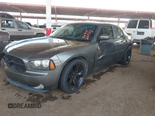 2008 Dodge Charger R/T with VIN 2B3KA53H48H266537, listed as a IAAI auction lot 42088411 with 239,155 mi miles and . Bid and sale history available at carsss.com. Image 2.