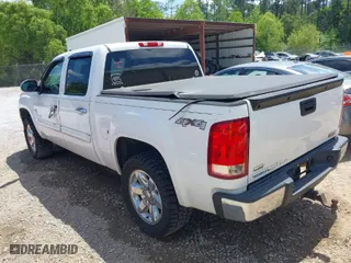 2012 GMC Sierra 1500 SLE with VIN 3GTP2VE73CG121892, listed as a IAAI auction lot 42028459 with 202,598 mi miles. Bid and sale history available at carsss.com. Image 3.