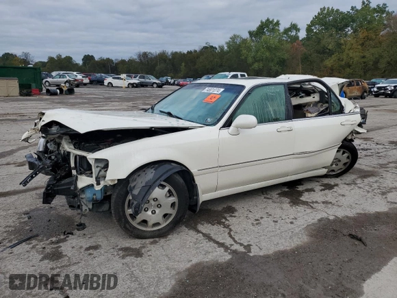 2004 Acura RL w/Navigation System with VIN JH4KA96684C001230, listed as a Copart auction lot 74801074 with 151,266 mi miles and Salvage Title. Bid and sale history available at carsss.com. Image 1.