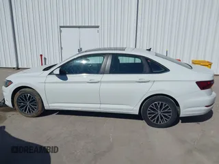 2021 Volkswagen Jetta S z VIN 3VWC57BU0MM070993, wystawiony jako IAAI lot #41650935 z przebiegiem 58 683 mil mil oraz . Historia ofert i sprzedaży dostępna na DreamBid. Obrazek 15.