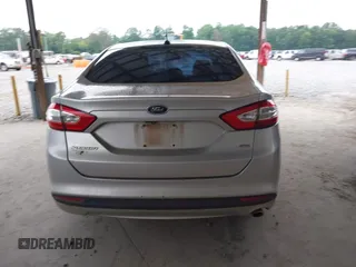 2016 Ford Fusion SE z VIN 1FA6P0H73G5129053, wystawiony jako IAAI lot #42632691 z przebiegiem 266 087 mil mil oraz . Historia ofert i sprzedaży dostępna na DreamBid. Obrazek 16.