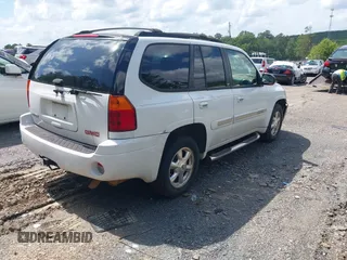 2003 GMC Envoy SLT with VIN 1GKDS13S632266506, listed as a IAAI auction lot 42149049 with 259,884 mi miles and . Bid and sale history available at DreamBid. Image 4.