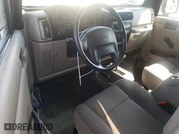 2003 Jeep Wrangler Sahara with VIN 1J4FA59S23P303845, listed as a Copart auction lot 68101244 with 141,753 mi miles and Clean Title. Bid and sale history available at carsss.com. Image 8.