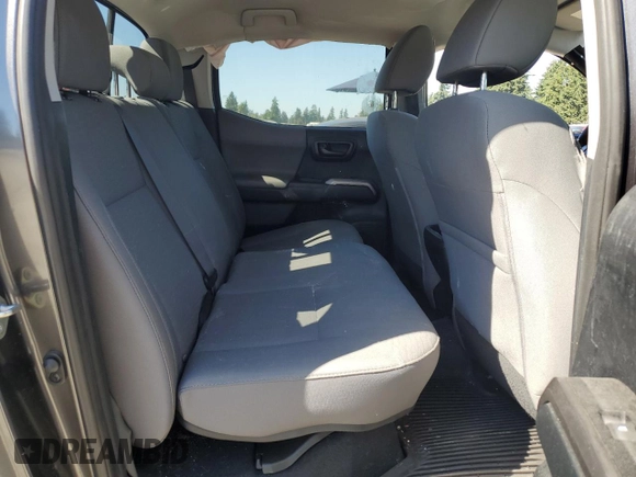 2017 Toyota Tacoma SR5 with VIN 3TMCZ5ANXHM052092, listed as a Copart auction lot 64898135 with 95,743 mi miles and Salvage title. Bid and sale history available at DreamBid. Image 10.