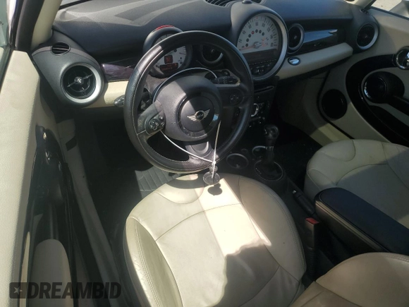 2011 MINI Hardtop with VIN WMWSU3C5XBTX96048, listed as a Copart auction lot 57607955 with 99,632 mi miles and Salvage title. Bid and sale history available at DreamBid. Image 8.