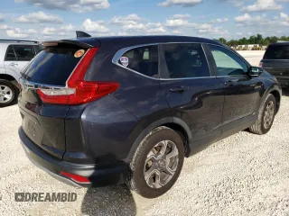 2018 Honda CR-V EX with VIN 7FARW1H57JE029448, listed as a Copart auction lot 70052882 with 57,388 mi miles. Bid and sale history available at carsss.com. Image 3.