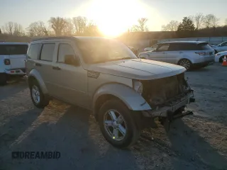 2010 Dodge Nitro SE z VIN 1D4PT2GK0AW104045, wystawiony jako Copart lot #46216635 z przebiegiem 170 533 mil mil oraz Szkody całkowita. Historia ofert i sprzedaży dostępna na DreamBid. Obrazek 4.