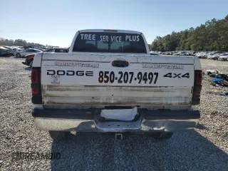 1999 Dodge 2500 with VIN 1B7KF23Z6XJ558288, listed as a Copart auction lot 86252004 with 251,023 mi miles and Salvage title. Bid and sale history available at DreamBid. Image 6.