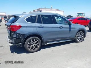 2021 BMW X1 sDrive28i z VIN WBXJG7C02M5T37169, wystawiony jako IAAI lot #42226396 z przebiegiem 48 603 mil mil oraz . Historia ofert i sprzedaży dostępna na DreamBid. Obrazek 14.
