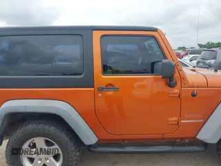 2011 Jeep Wrangler Sport with VIN 1J4AA2D1XBL579882, listed as a IAAI auction lot 42122353 with 153,885 mi miles and . Bid and sale history available at carsss.com. Image 13.