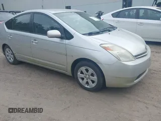2005 Toyota Prius z VIN JTDKB20U257051452, wystawiony jako IAAI lot #42451660 z przebiegiem 166 106 mil mil oraz . Historia ofert i sprzedaży dostępna na DreamBid. Obrazek 1.