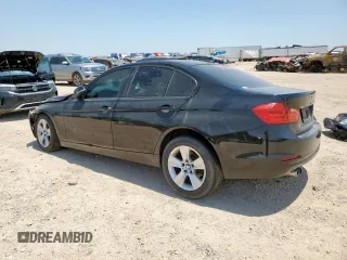 2015 BMW 3 Series 328i with VIN WBA3A5C58FF609385, listed as a Copart auction lot 61443955 with 195,705 mi miles and Salvage title. Bid and sale history available at DreamBid. Image 2.