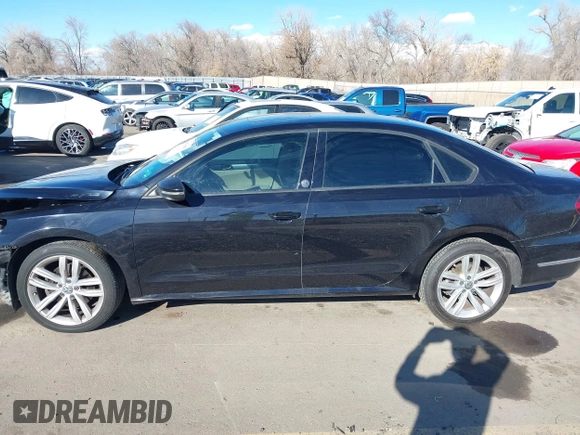 2019 Volkswagen Passat 2.0T Wolfsburg Edition with VIN 1VWLA7A32KC012841, listed as a IAAI auction lot 41539683 with 75,897 mi miles. Bid and sale history available at carsss.com. Image 14.